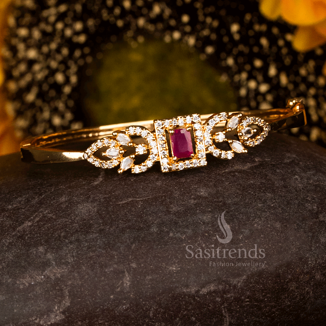 Micro Gold Plated American Diamond Kada Bracelet with a ruby square centre stone bordered by AD frame work and marquise side elements, crafted using 24K pure gold micro plating for a royal real-gold finish - Sasitrends 