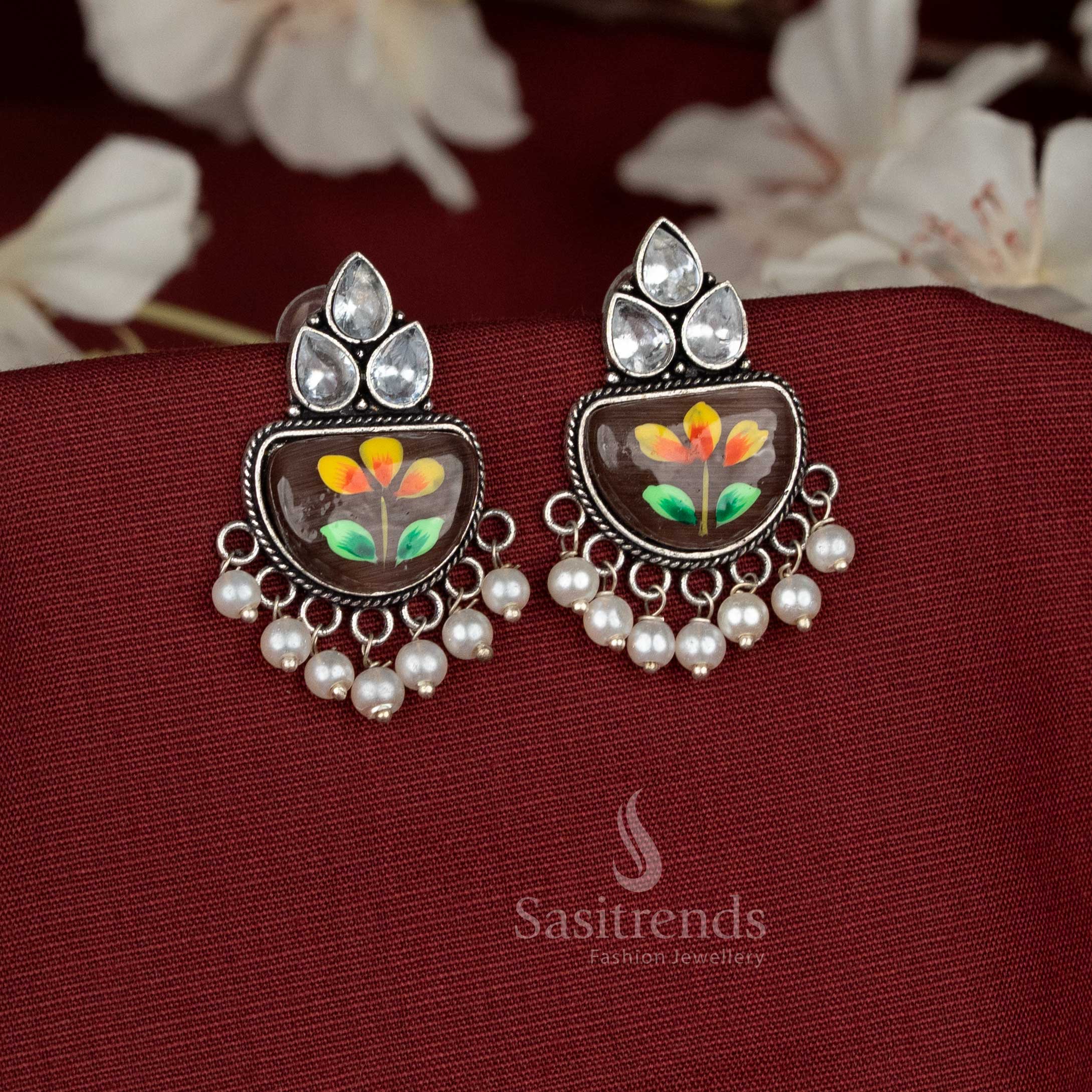 Daily wear white Hand-painted brown oxidised Monalisa stone white teardrop motif earrings with hanging pearls - Sasitrends