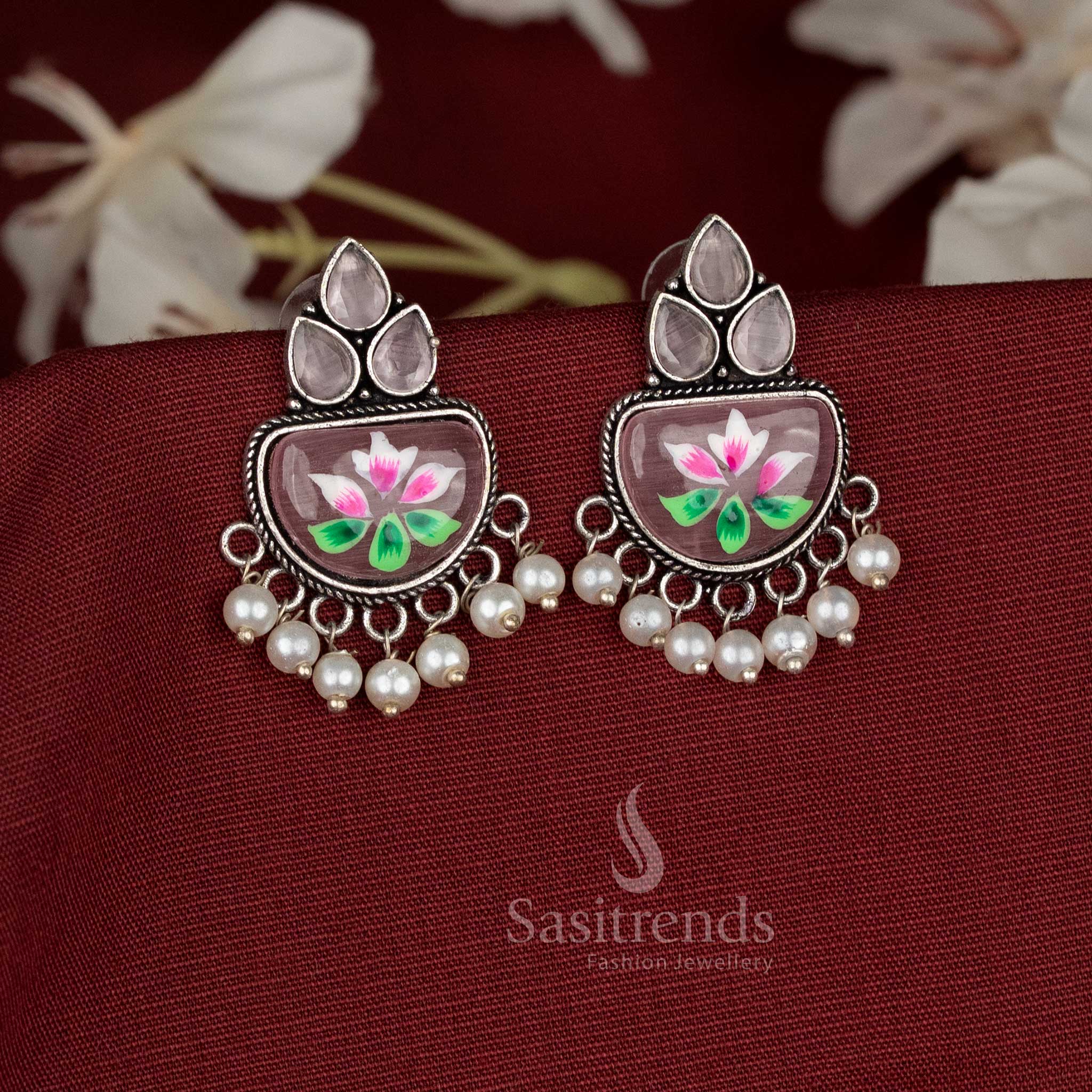 Elegant white Hand-painted brown oxidised Monalisa stone teardrop motif earrings with hanging pearls - Sasitrends