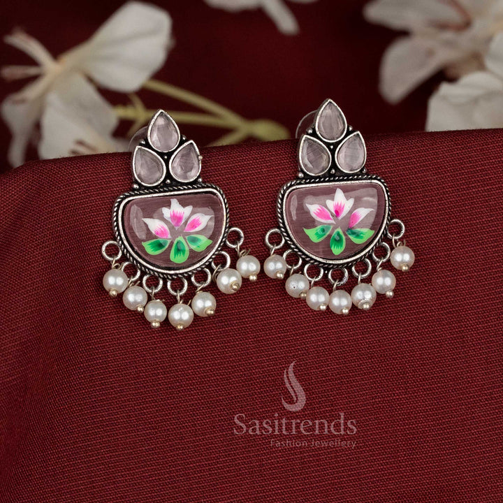 Elegant white Hand-painted brown oxidised Monalisa stone teardrop motif earrings with hanging pearls - Sasitrends