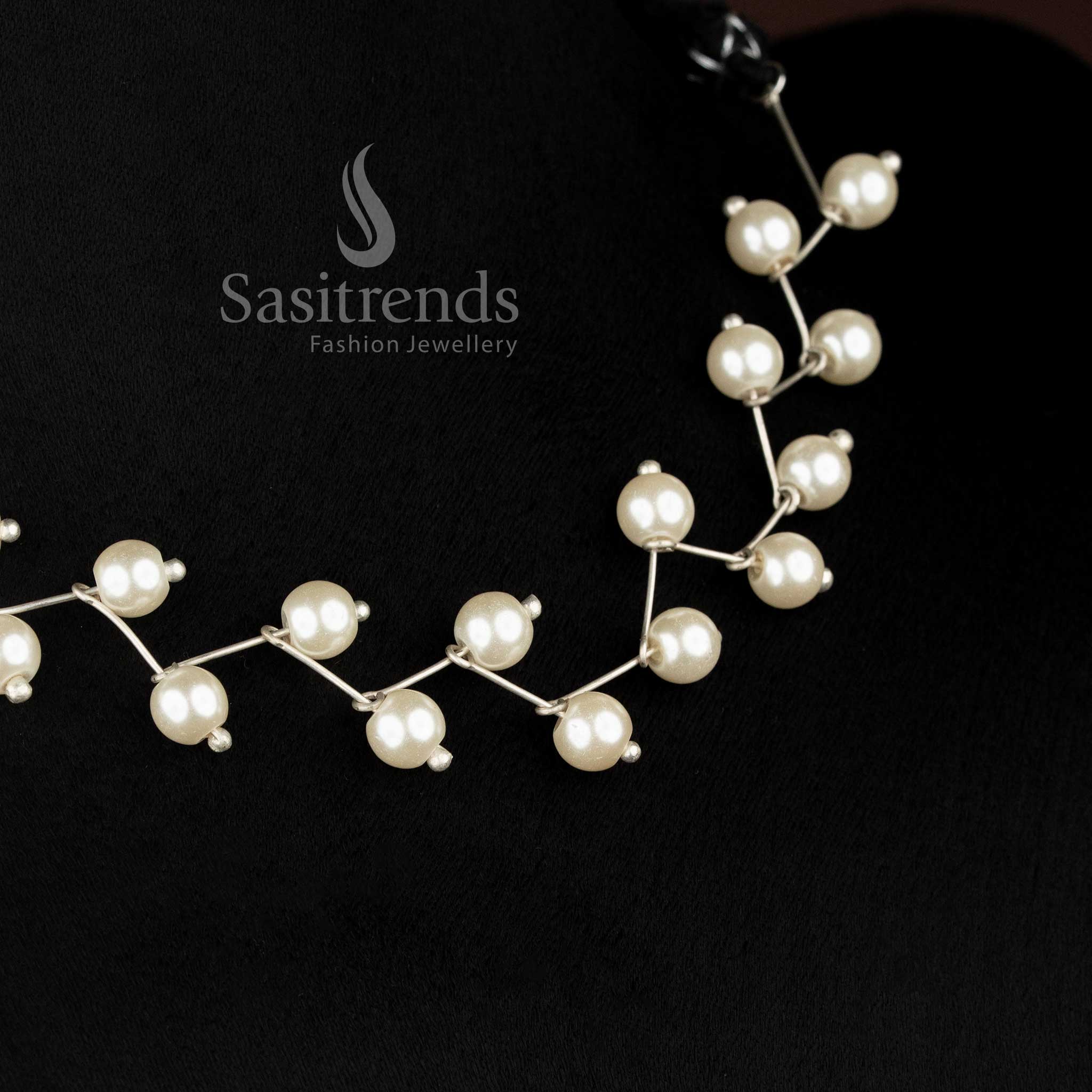 Elegant oxidised pearl necklace with twisted wire pattern for festive styling Sasitrends