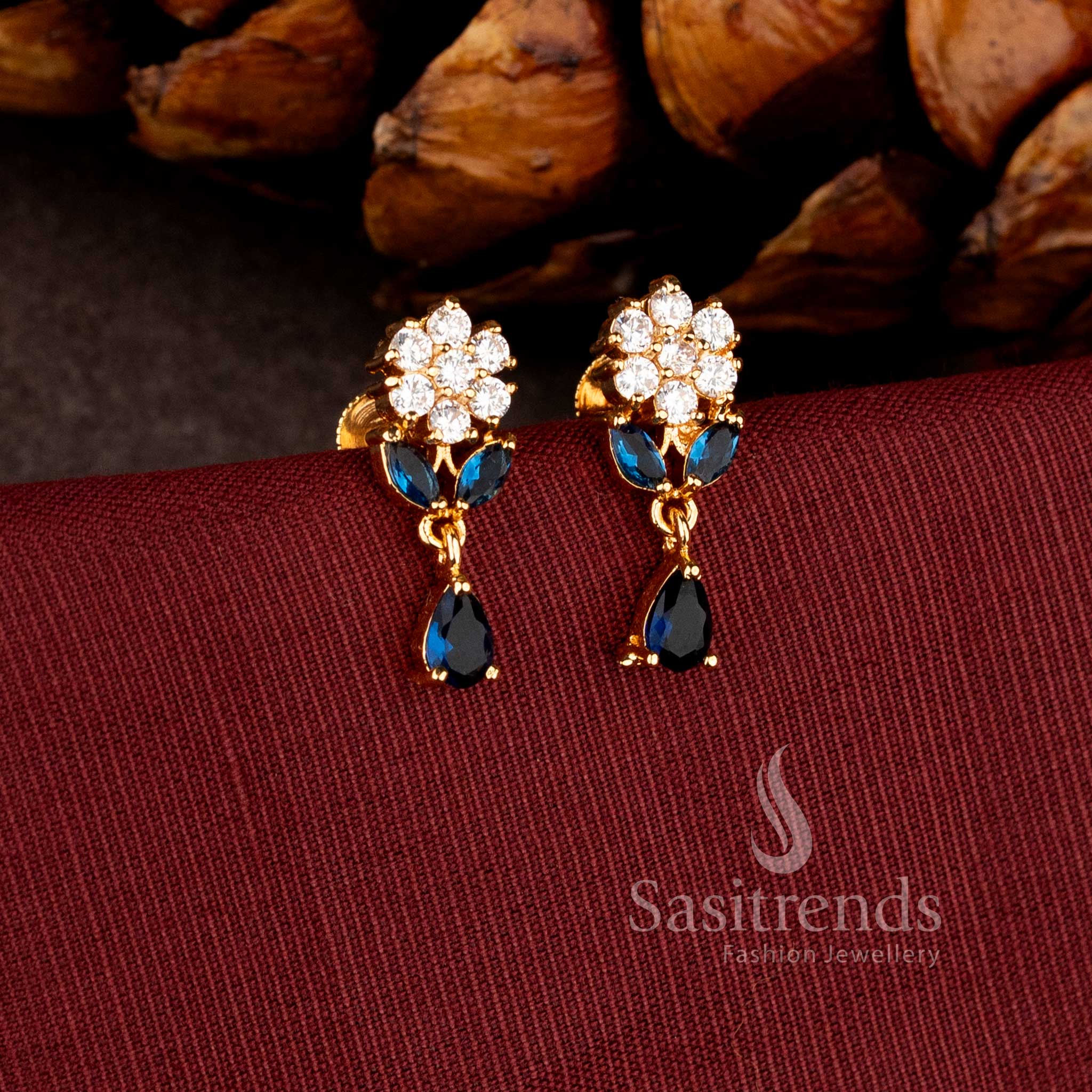 Sasitrends premium micro gold plated dangler earrings adorned with a brilliant teardrop AD stone stud and rich polished finish perfect for bridal and grand celebration wear.
