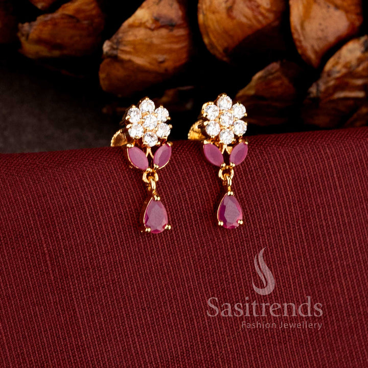 Sasitrends premium micro gold plated pearl cluster dangler earrings adorned with a brilliant teardrop AD stone stud and rich polished finish perfect for bridal and grand celebration wear.