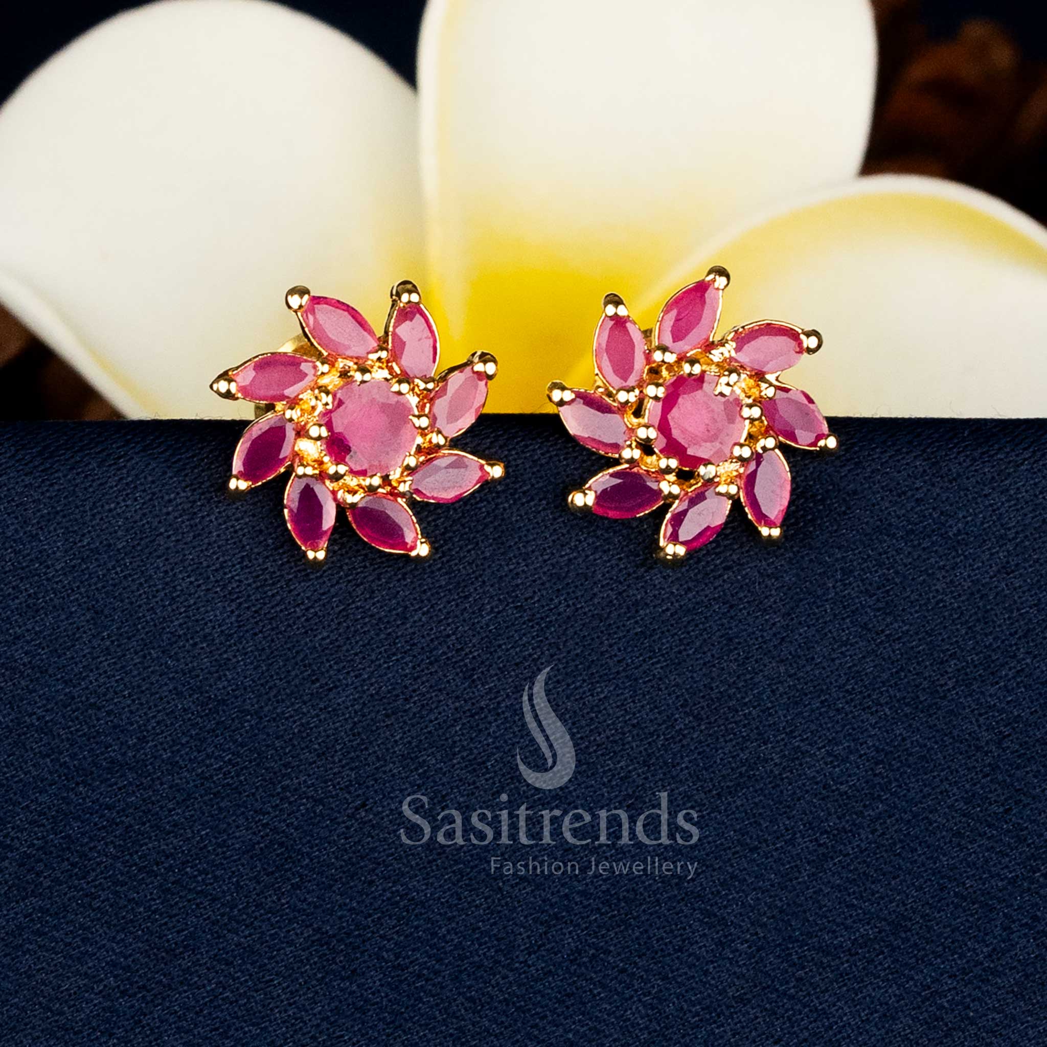 Elegant petal floral AD stone stud earrings with dangling pearls for ethnic styling Sasitrends
