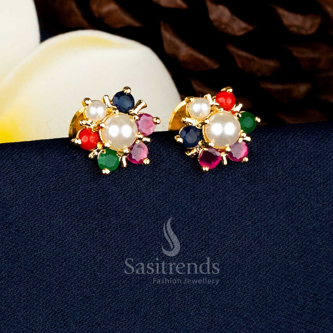 Traditional Micro gold plated floral stud earrings with central pearl and clustered Navarathna AD stone petal design, premium traditional finish with real-gold look - Sasitrends