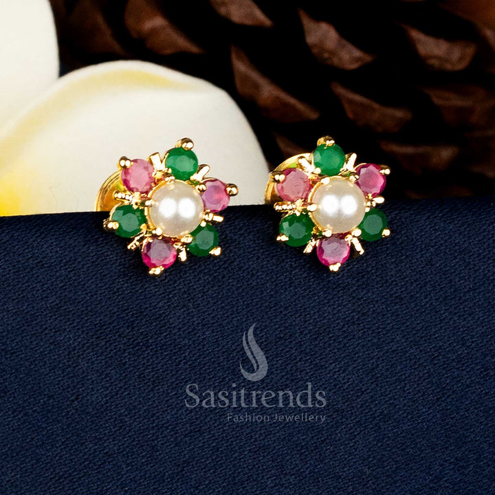 Traditional floral motif Ruby green AD stone stud earrings featuring a pearl centre and 24k pure gold plated guaranteed finish for premium ethnic styling - Sasitrends