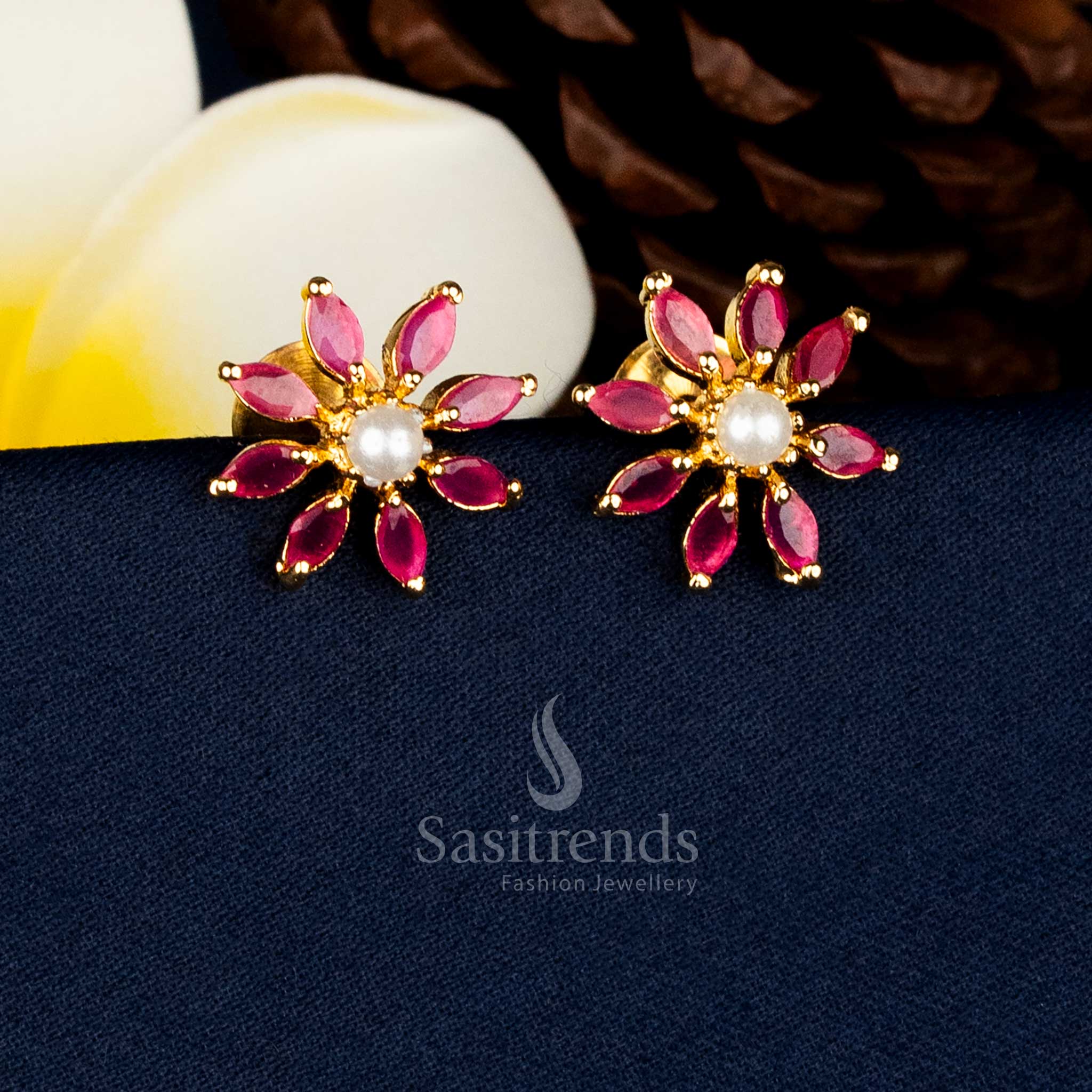 Attractive one gram 24K Micro Gold Plated Starburst Design Ruby AD Stone Stud Earrings For Traditional Wear - Sasitrends