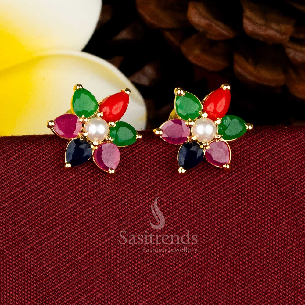 Micro gold plated teardrop petal flower AD stone and pearl stud earrings for traditional and festive wear Sasitrends