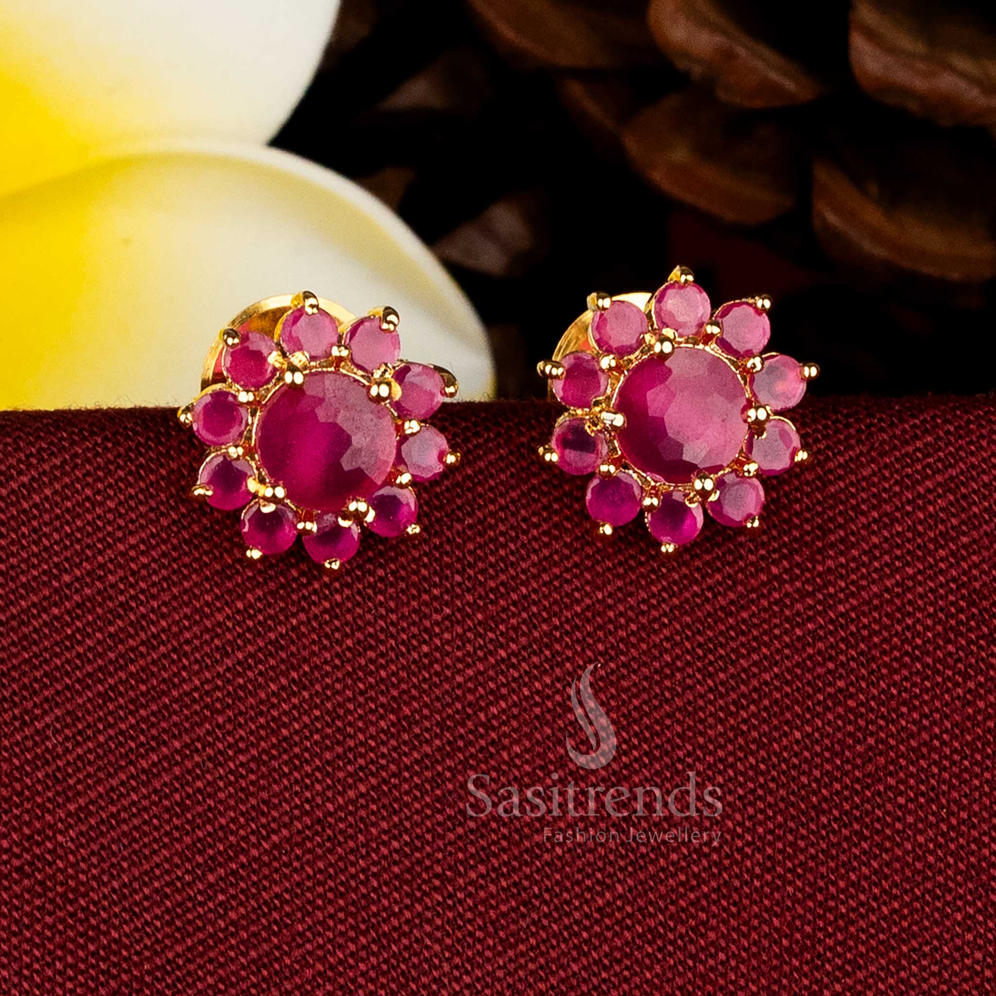 Gold plated round floral stud earrings adorned with AD stones and pearls for elegant occasions Sasitrends