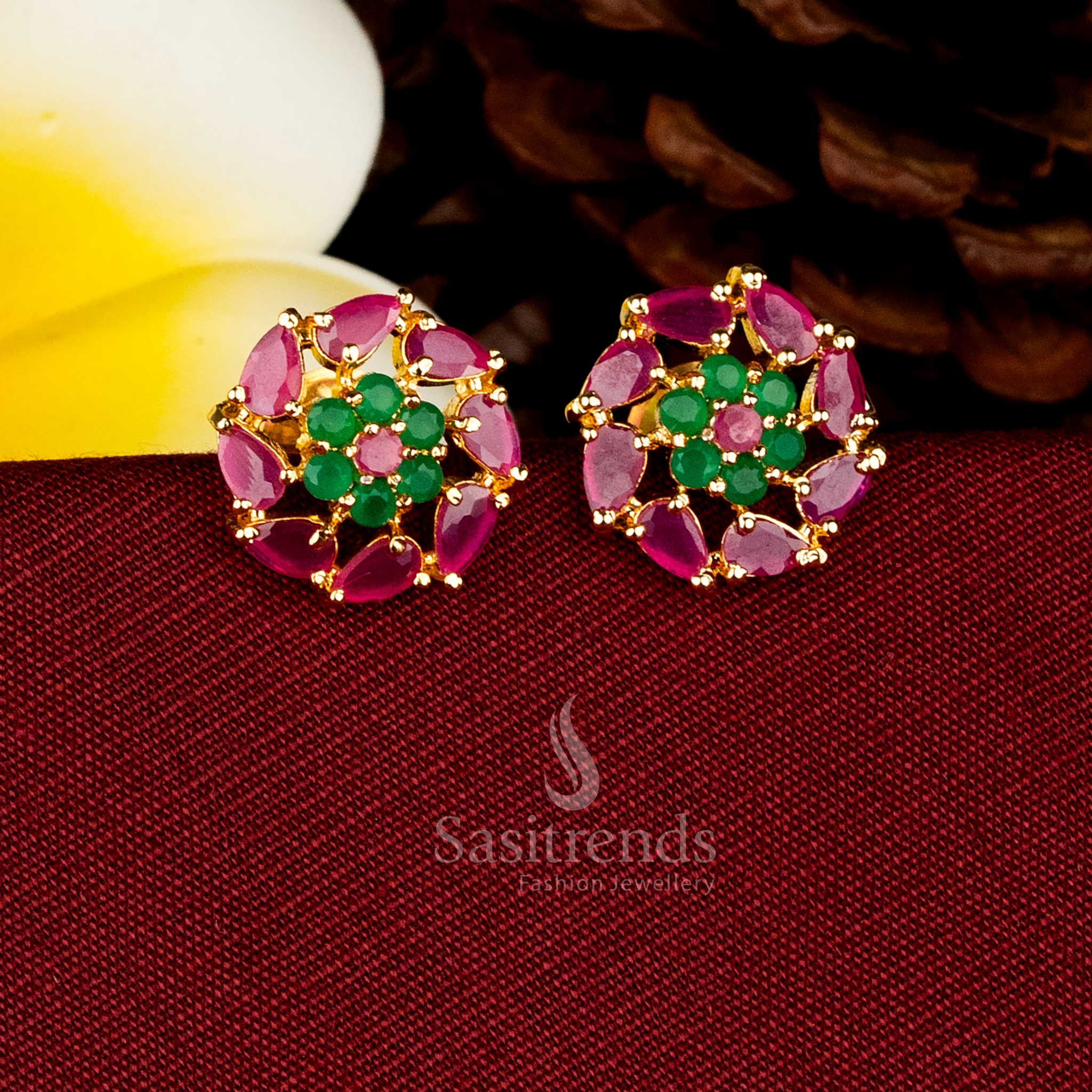 Sasitrends premium micro gold circular motif ruby green AD stone stud earrings crafted with 24K gold plating and guaranteed gold-look finish.