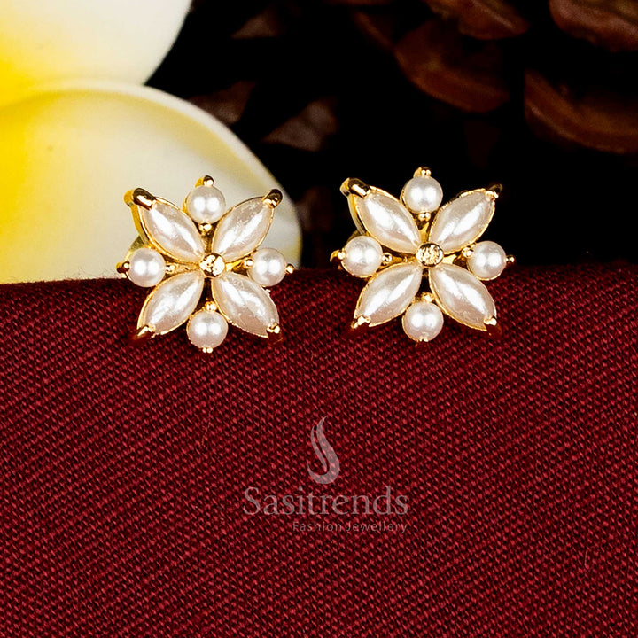 Marquise-cut four-petal floral pearl AD micro studs perfect for reception saree styling Sasitrends