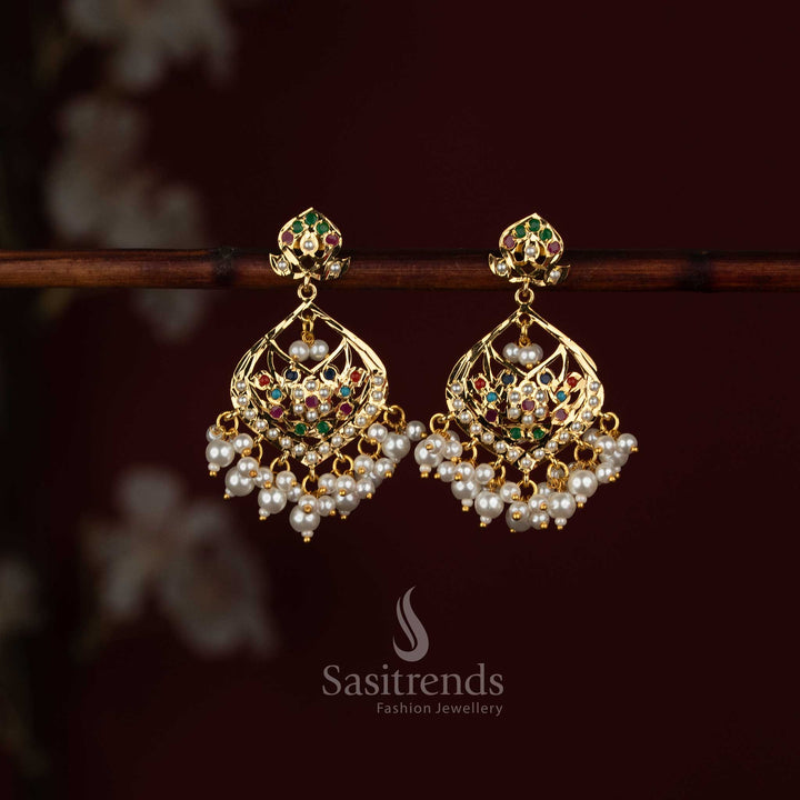 24K micro gold plated traditional Jadau earrings with Navarathna stones and pearl drop embellishments by Sasitrends