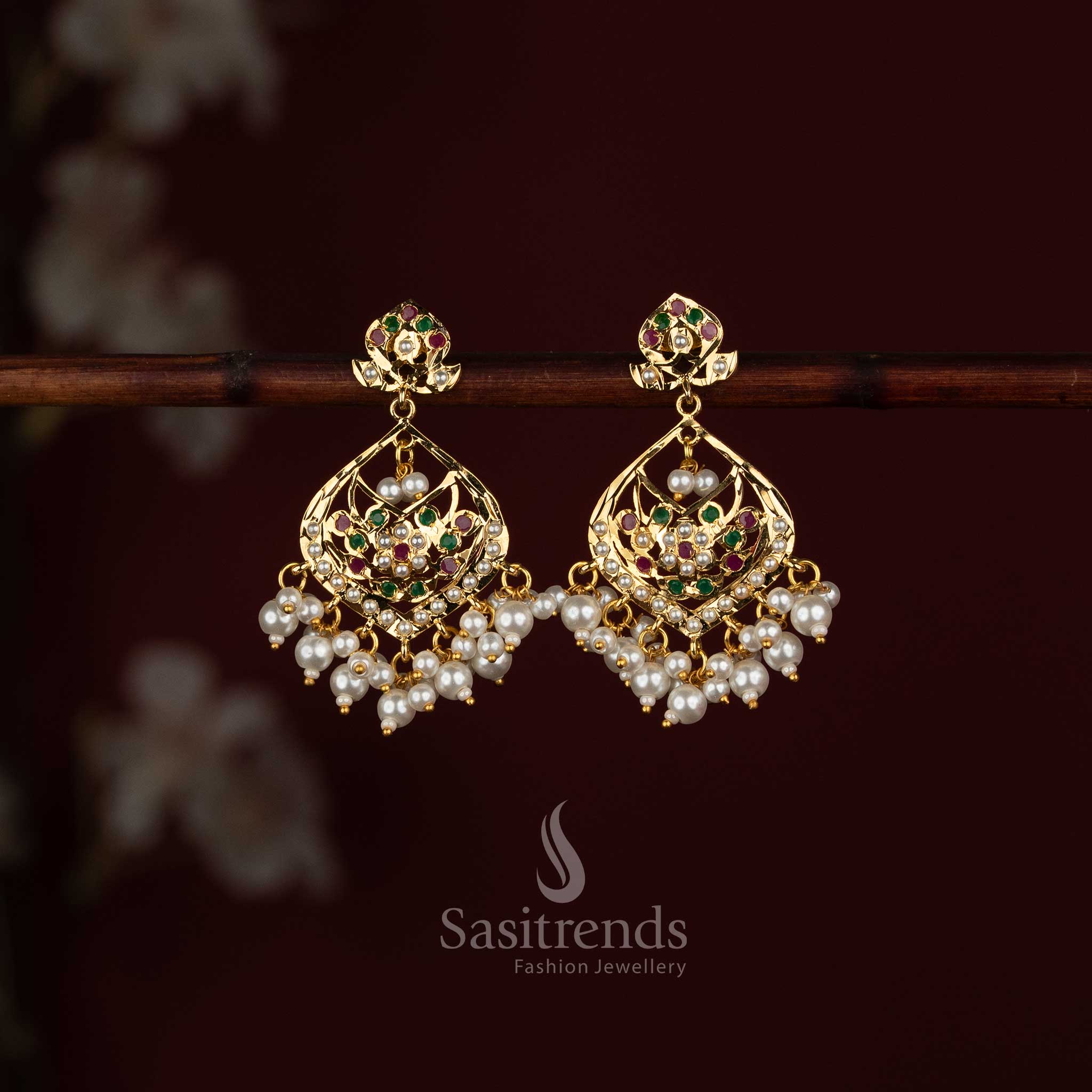 Grand wear Punjabi Jadau earrings featuring ornamental Navarathna stones and pearl drop accents