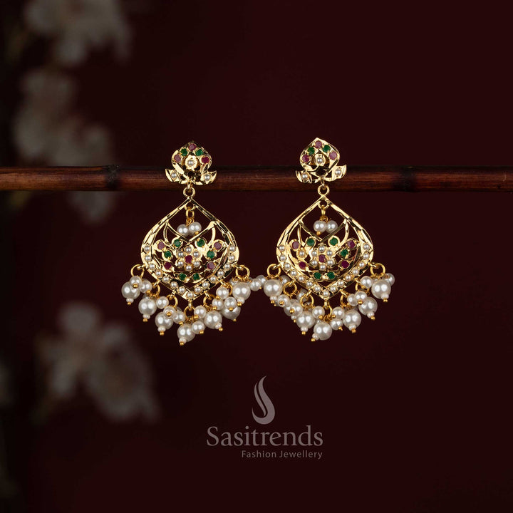 Grand wear Punjabi Jadau earrings featuring ornamental Navarathna stones and pearl drop accents