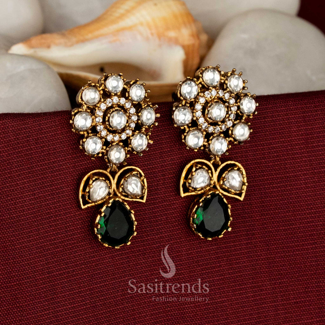 Party wear Victorian plated green AD stone floral stud earrings with leaf and drop structure - Sasitrends