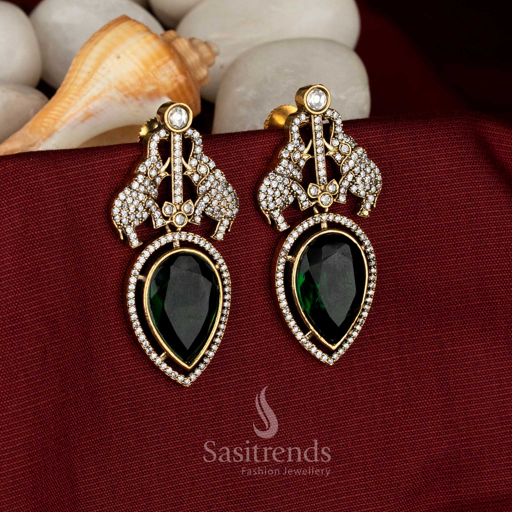 Elegant Victorian Plated green AD-studded earrings featuring artistic elephant detailing - Sasitrends