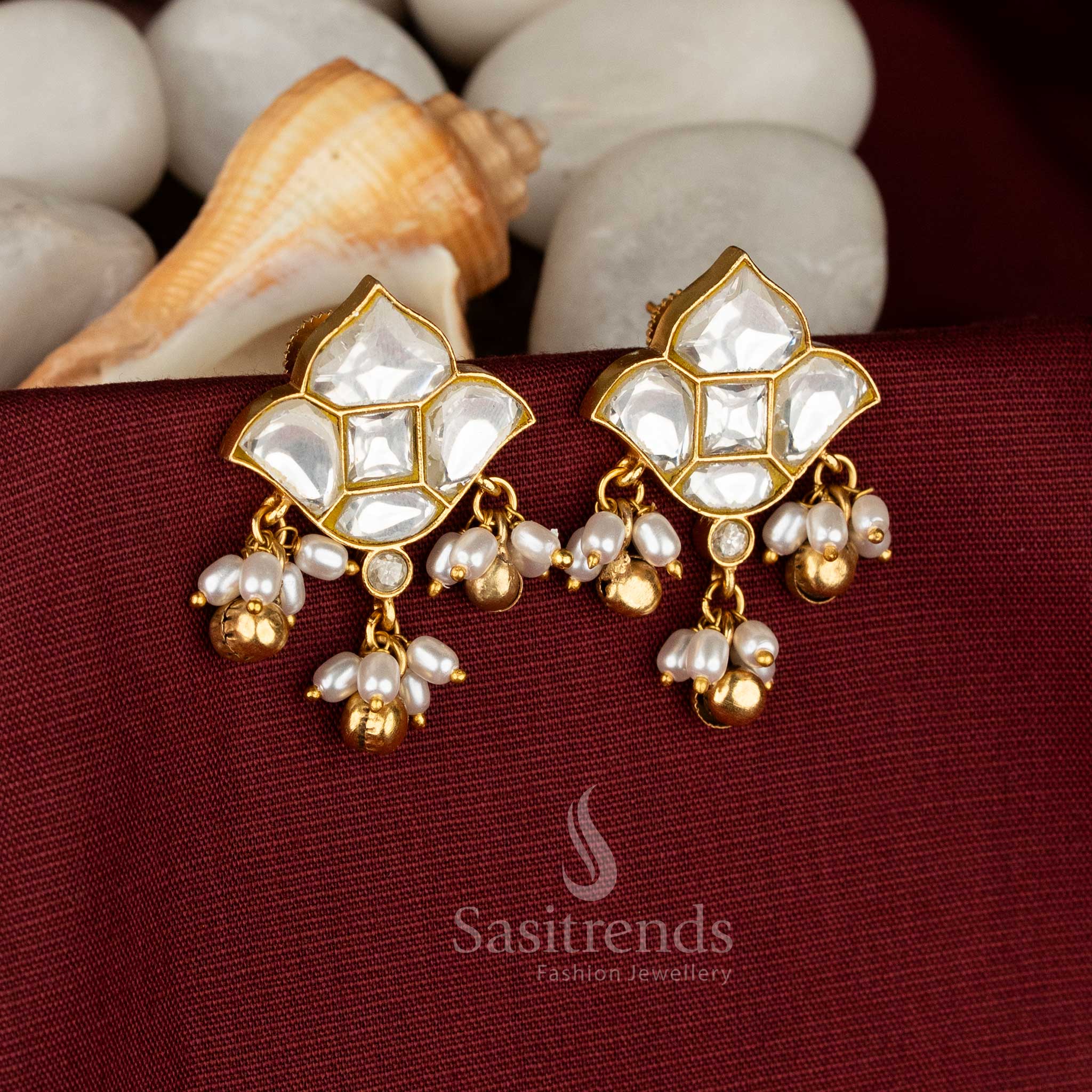 Traditional festive wear 24k jadau gold plated lotus motif white stone stud earrings with hanging pearls and golden balls - Sasitrends