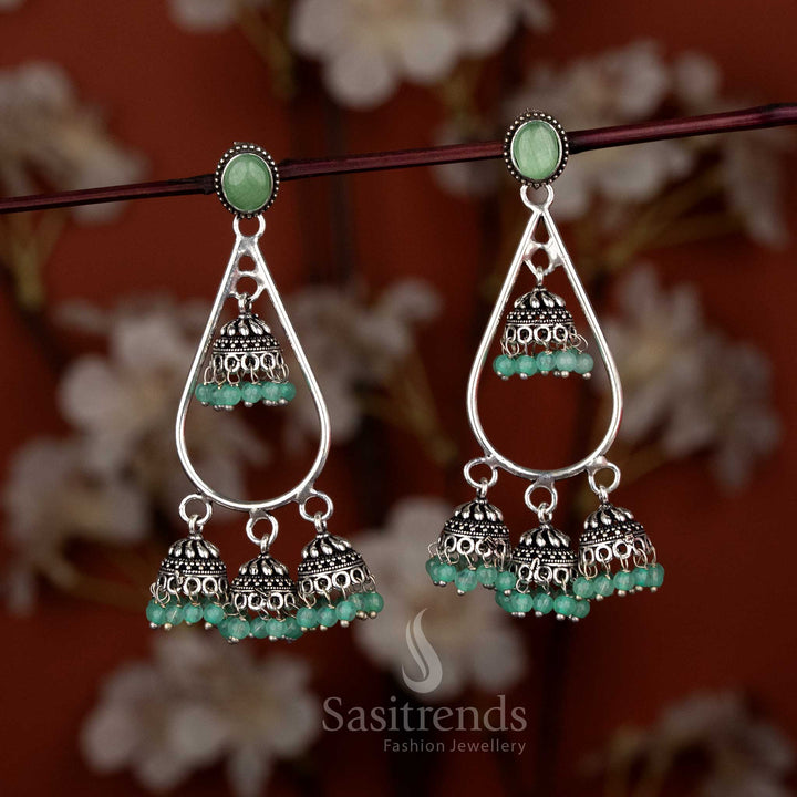 Oxidised silver teardrop stone mini jhumkas for saree ensembles and family gatherings – Sasitrends