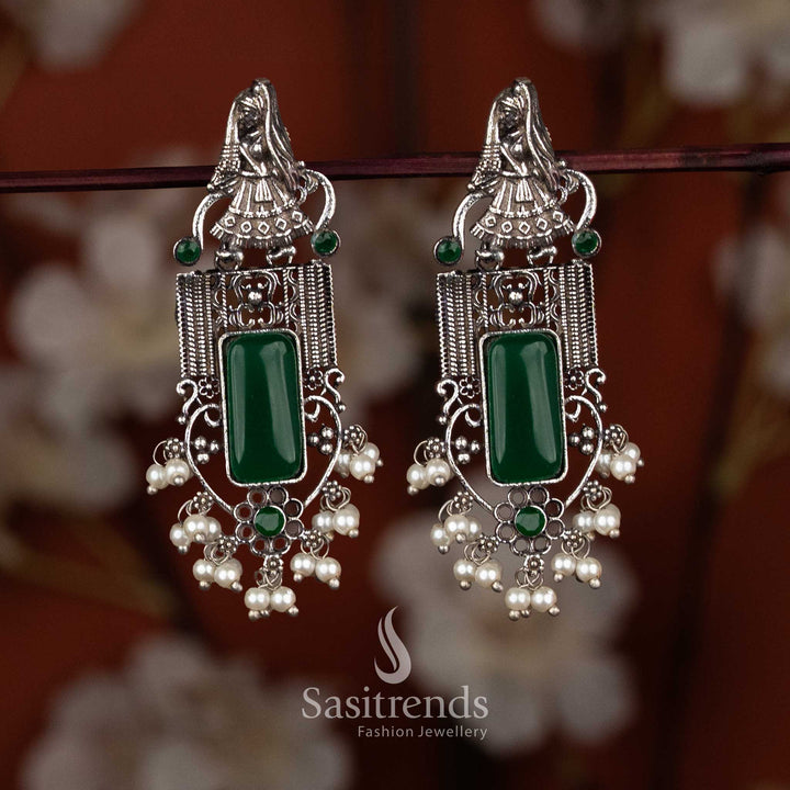 Elegant oxidised dancer design earrings with pearl cluster and green square stone center by Sasitrends, daily ethnic wear
