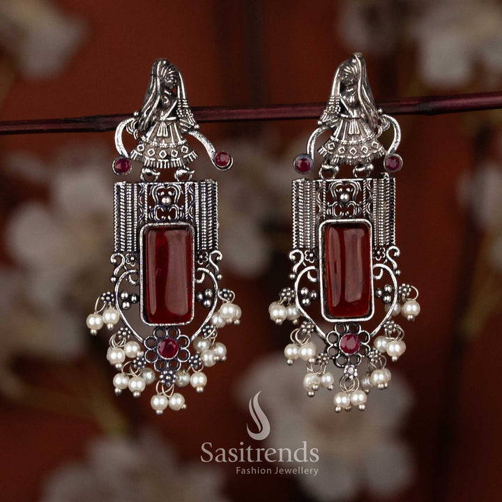 Traditional oxidised dancer motif pearl cluster earrings with red center stone by Sasitrends, Navaratri special