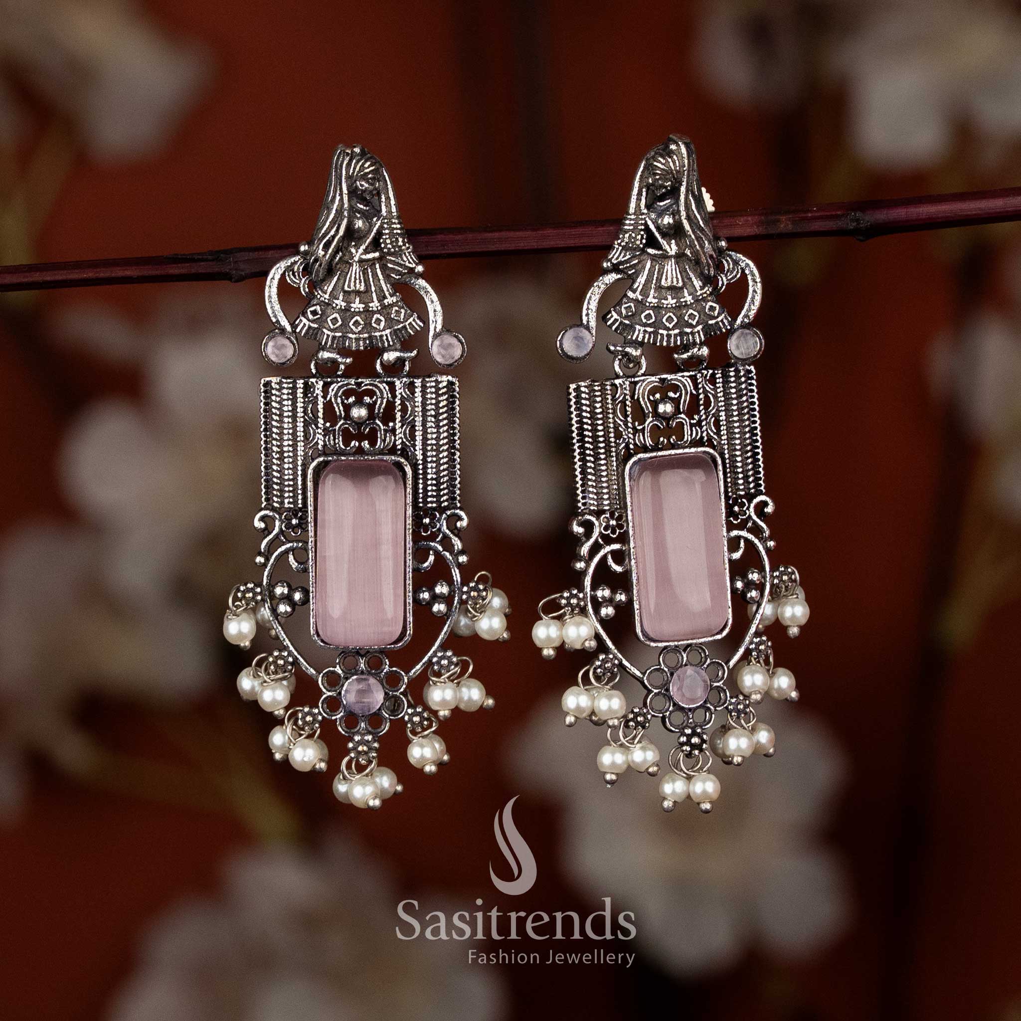 Sasitrends antique oxidised earrings with pink square stone centerpiece and dancing motif, suitable for casual ethnic outfits