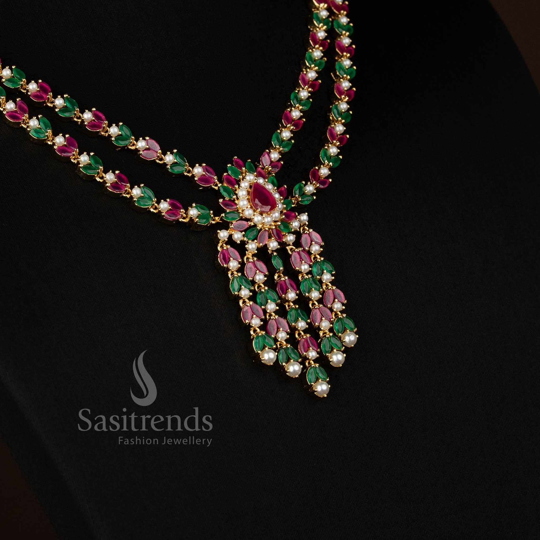 wedding and festive wear american diamond jewellery set with teardrop stone motif and real gold look finish