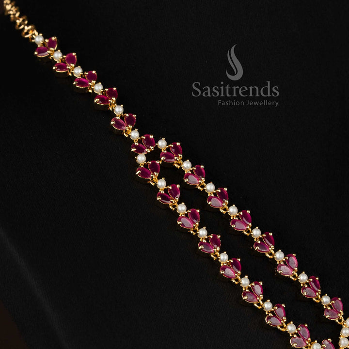 Wedding and festive wear american diamond jewellery set with teardrop stone motif and real gold look finish