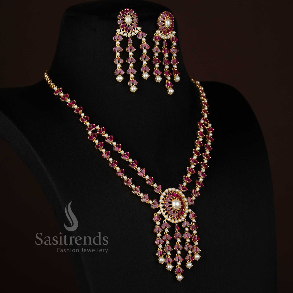 Sasitrends american diamond micro gold plated necklace set featuring teardrop centre stone and layered pearl drop design