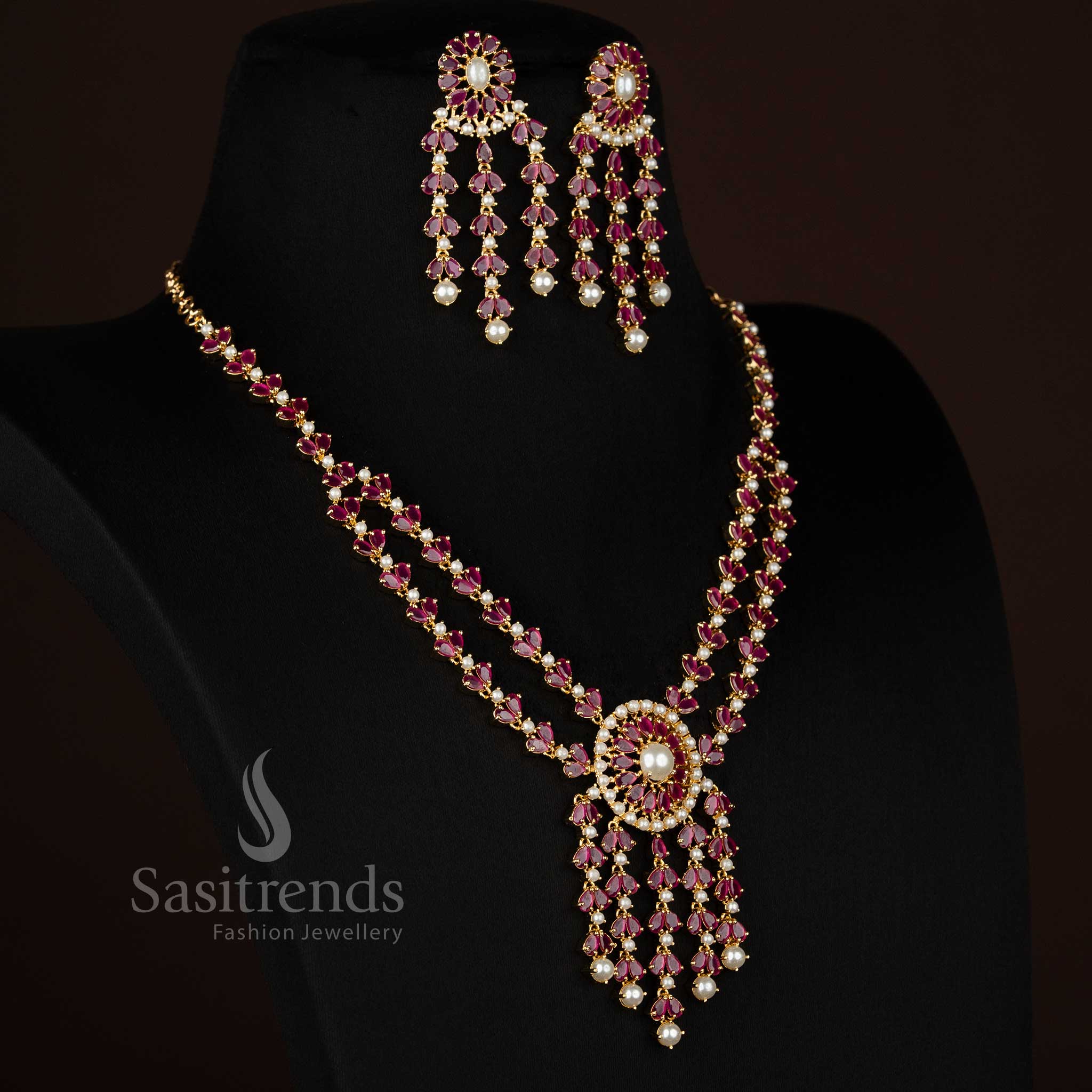 Sasitrends american diamond micro gold plated necklace set featuring teardrop centre stone and layered pearl drop design