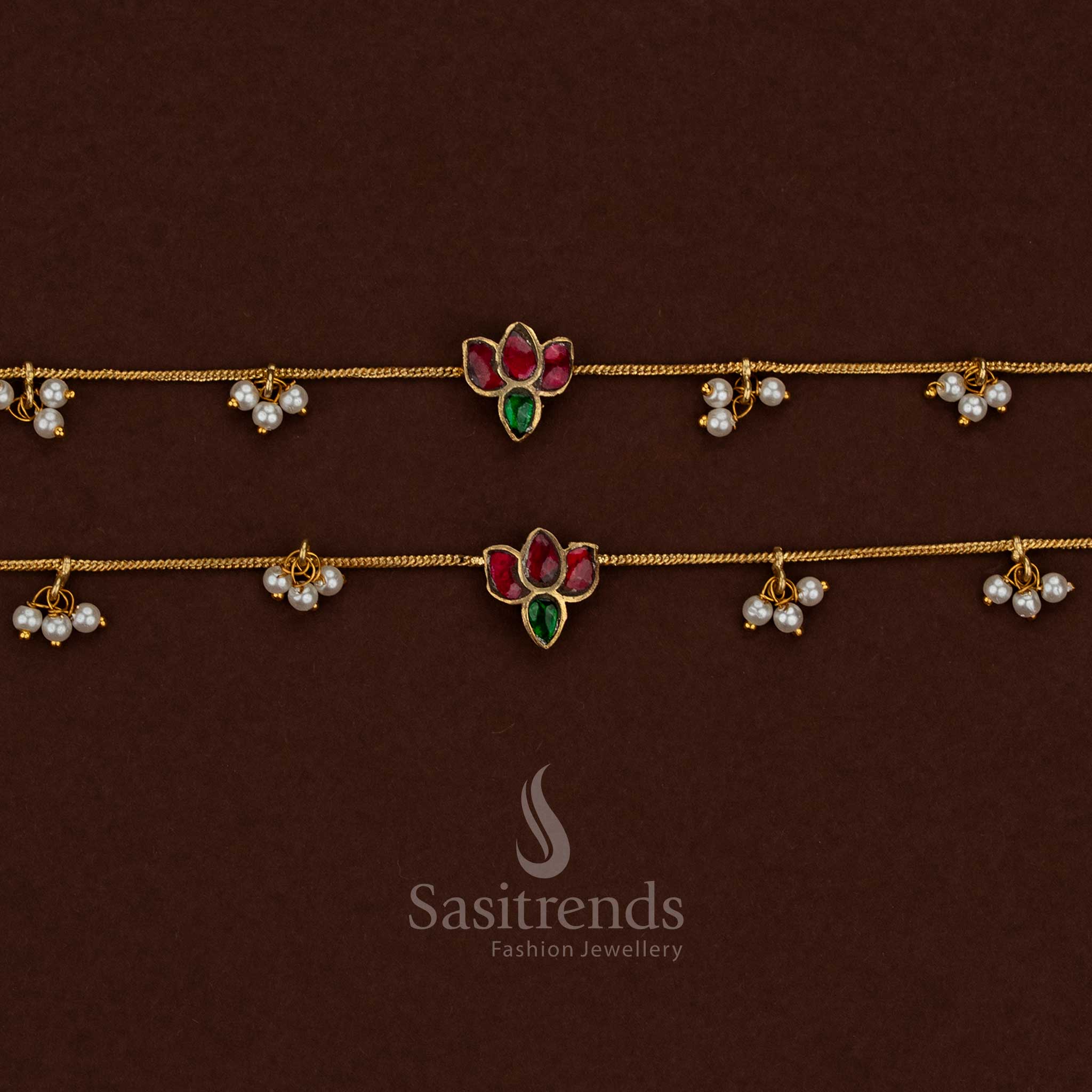 
Traditional floral leaf design kundan stone anklet with rich gold finish and handcrafted jadau work from Sasitrends
