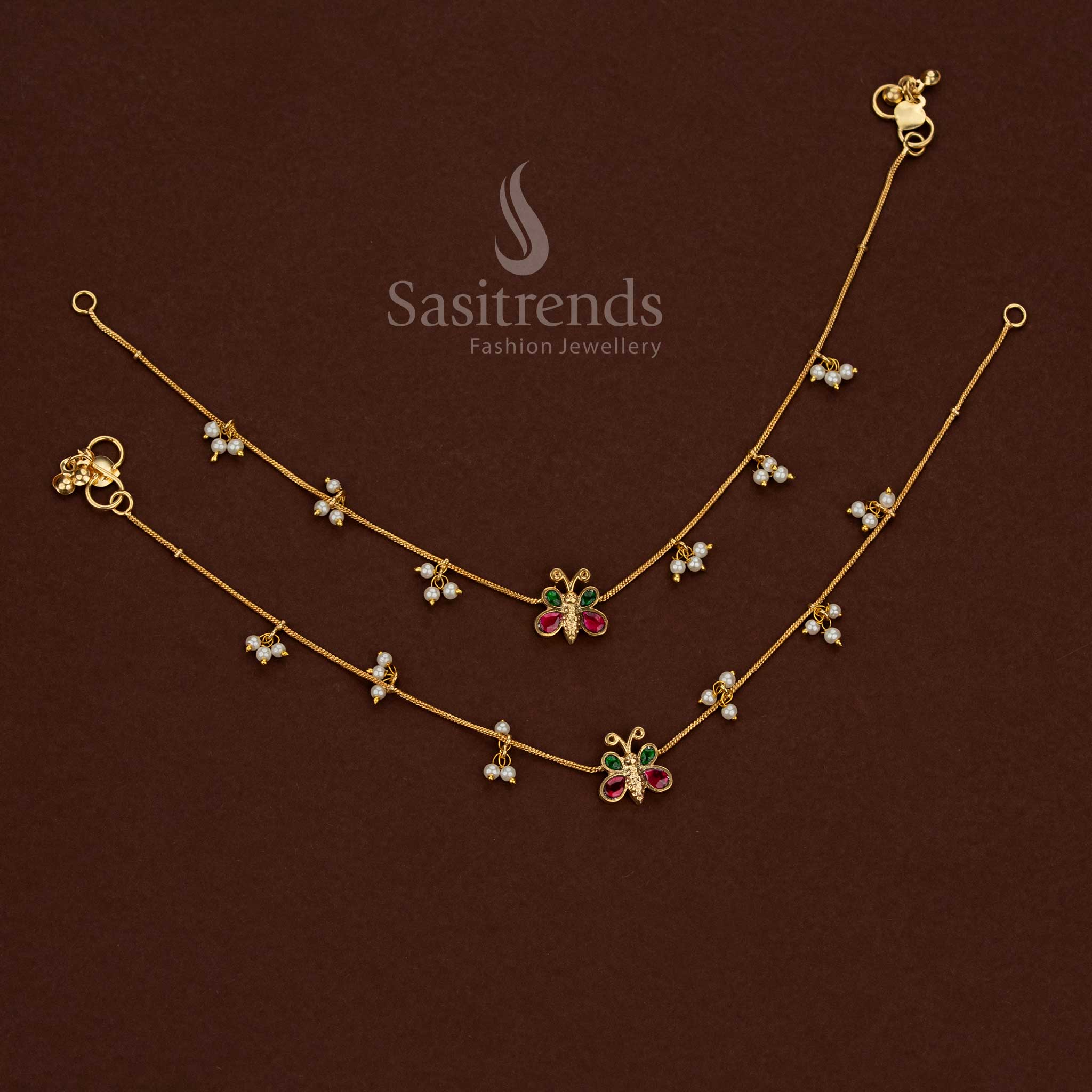 
24K jadau gold plated kundan stone anklet featuring a collection of butterfly designs with pearl accents - Sasitrends
