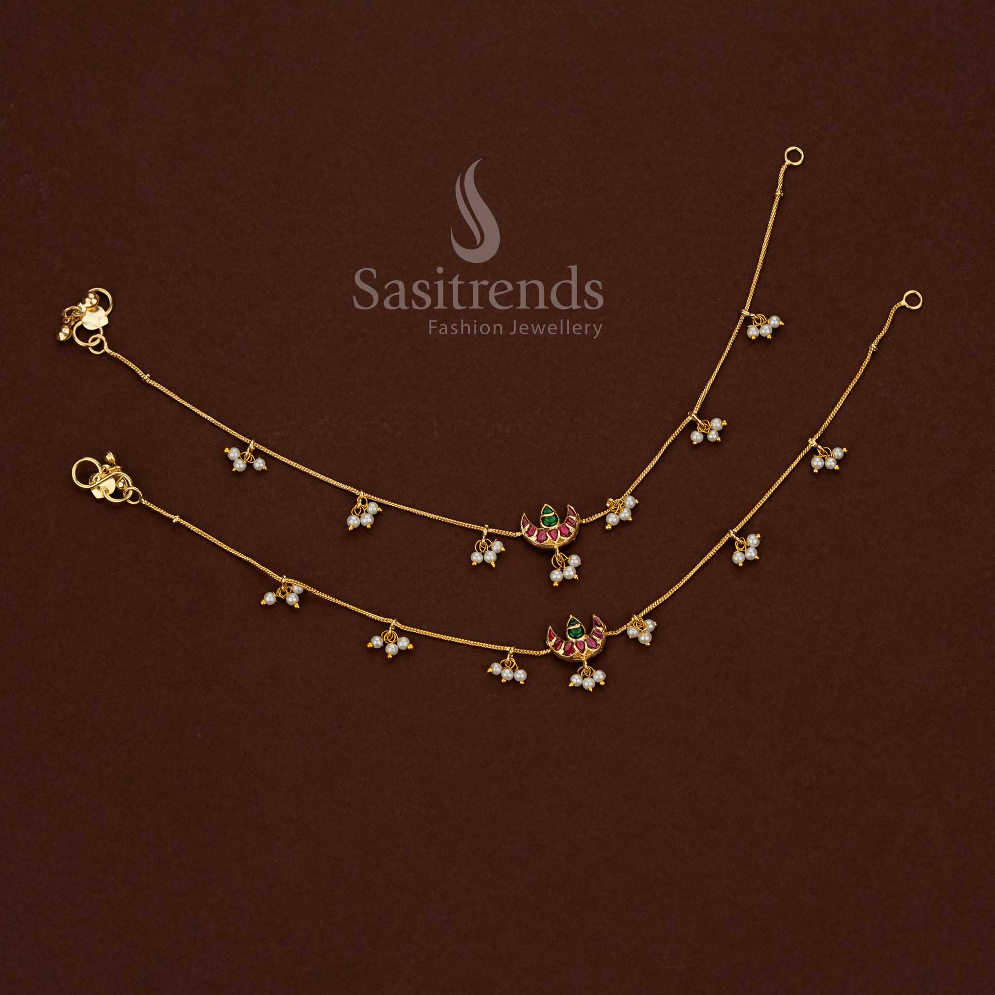 
Festive kundan stone anklet in crescent design with pearl cluster detailing and rich finish - Sasitrends
