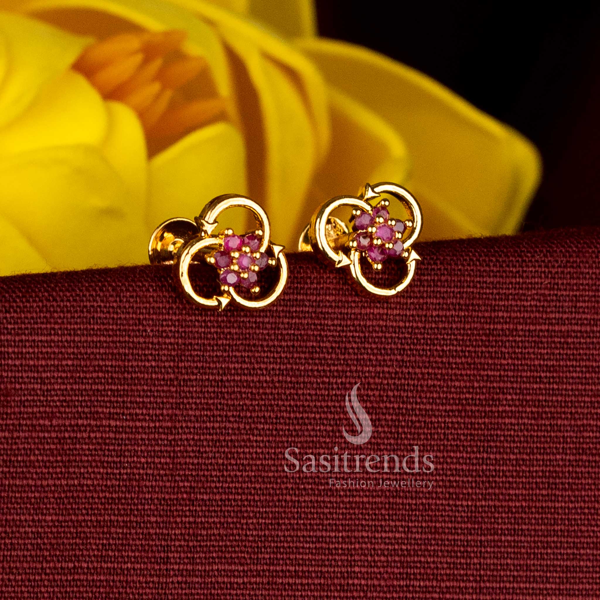 Sasitrends one gram 24K micro gold plated interlocked loop stud earrings with floral ruby AD stone design