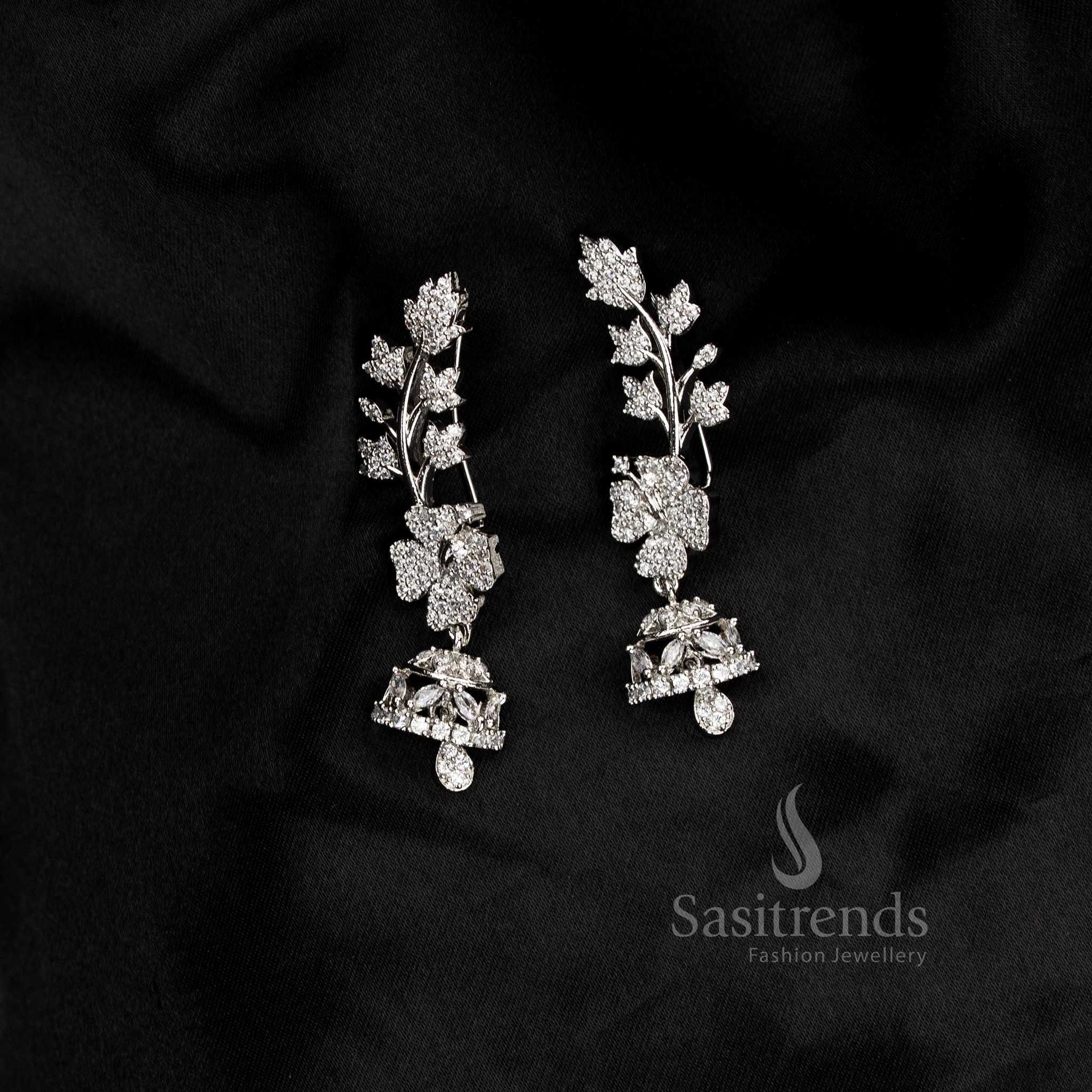 Party wear American diamond rhodium silver plated white floral motif earcuff earrings - Sasitrends