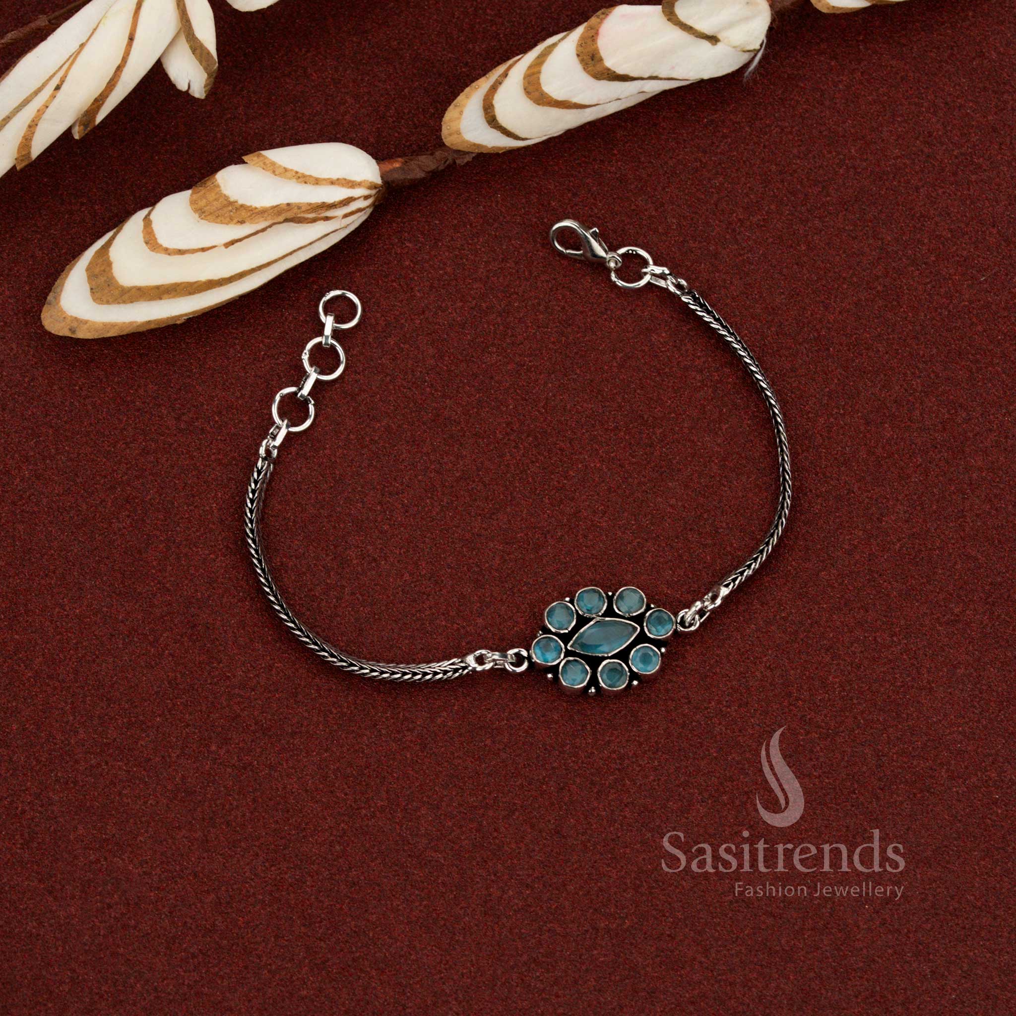 Gorgeous oxidised floral medallion chain sky blue stone bracelet for casual and office styling – Sasitrends