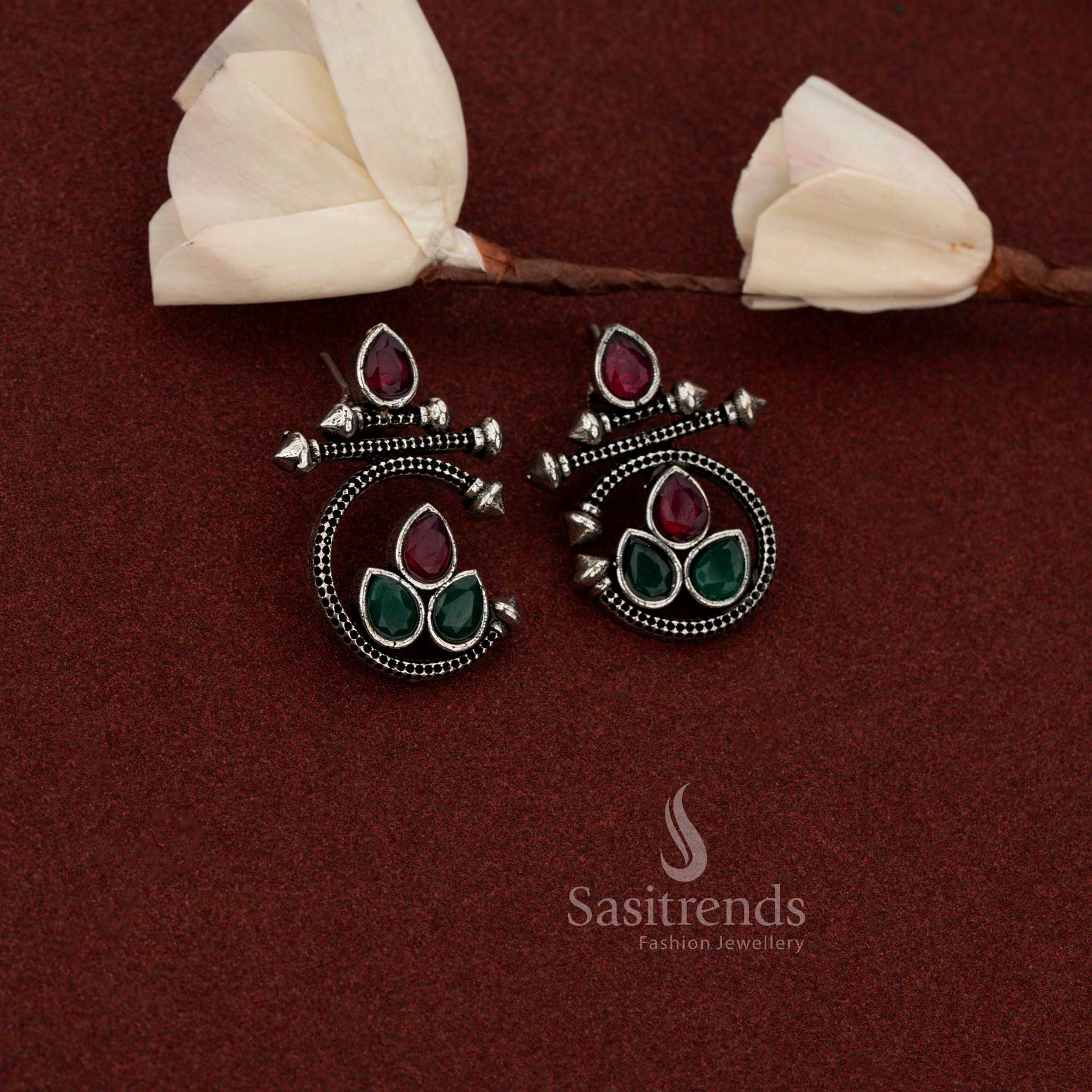Sasitrends elegant oxidised silver earrings highlighting a teardrop structure combined with geometric spike ruby green stone elements
