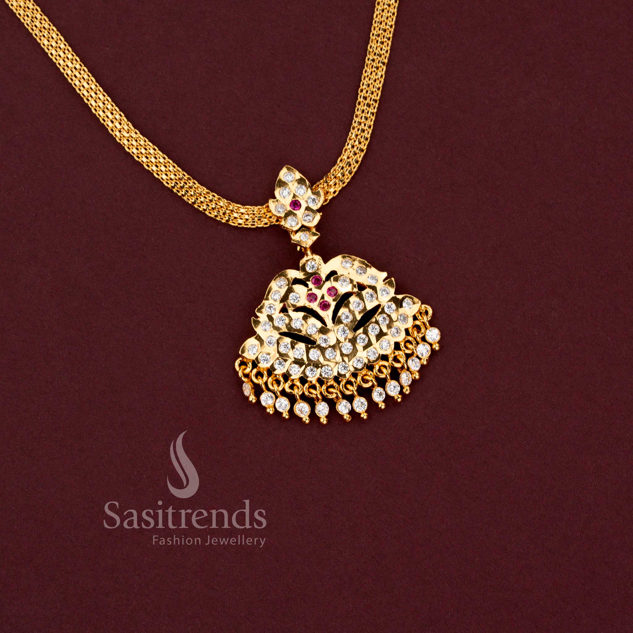 Festive and bridal wear traditional South Indian impon addigai necklace with a bright gold finish - Sasitrends.