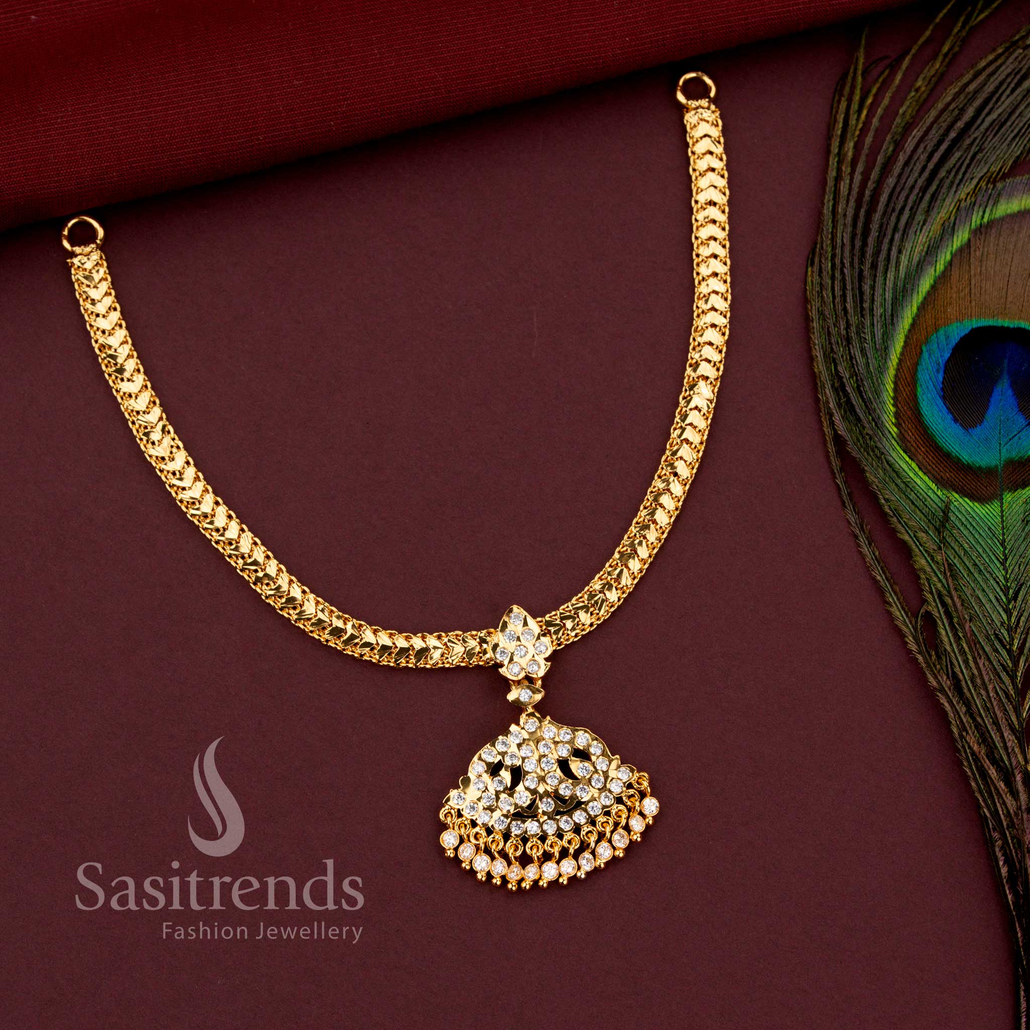 Sasitrends Impon braided gati necklace with fan shaped filigree pendant and AD stone tassels 