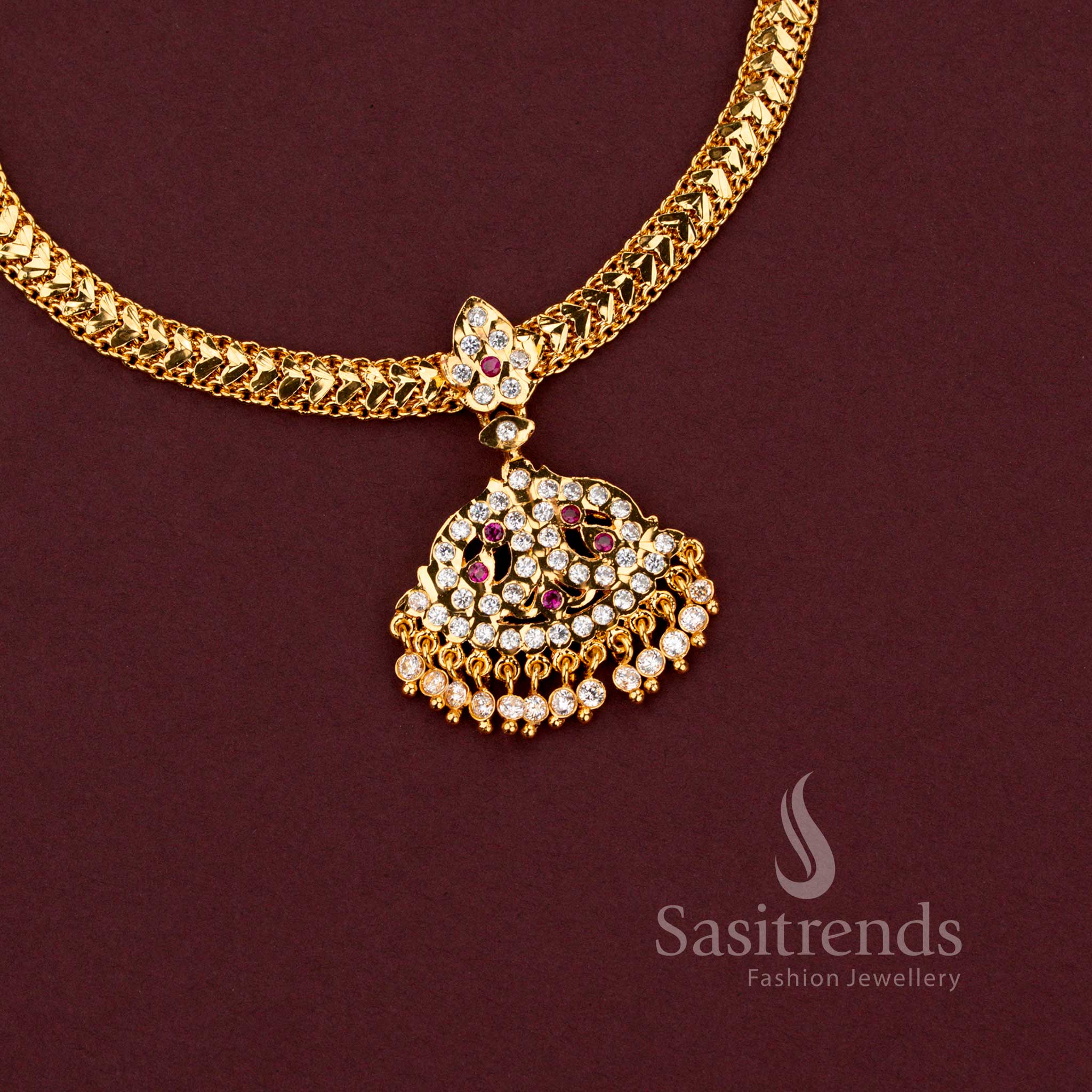 Impon braided gati necklace with fan shaped filigree pendant and AD stone tassels - Sasitrends 