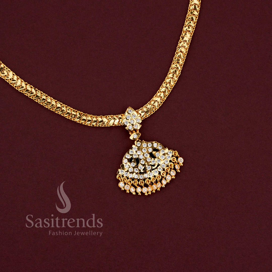 Sasitrends Impon braided gati necklace with fan shaped filigree pendant and AD stone tassels 