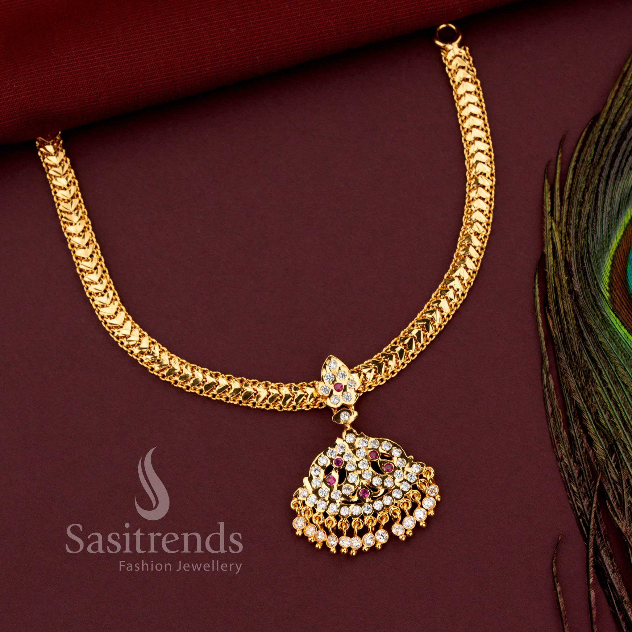Impon braided gati necklace with fan shaped filigree pendant and AD stone tassels - Sasitrends 