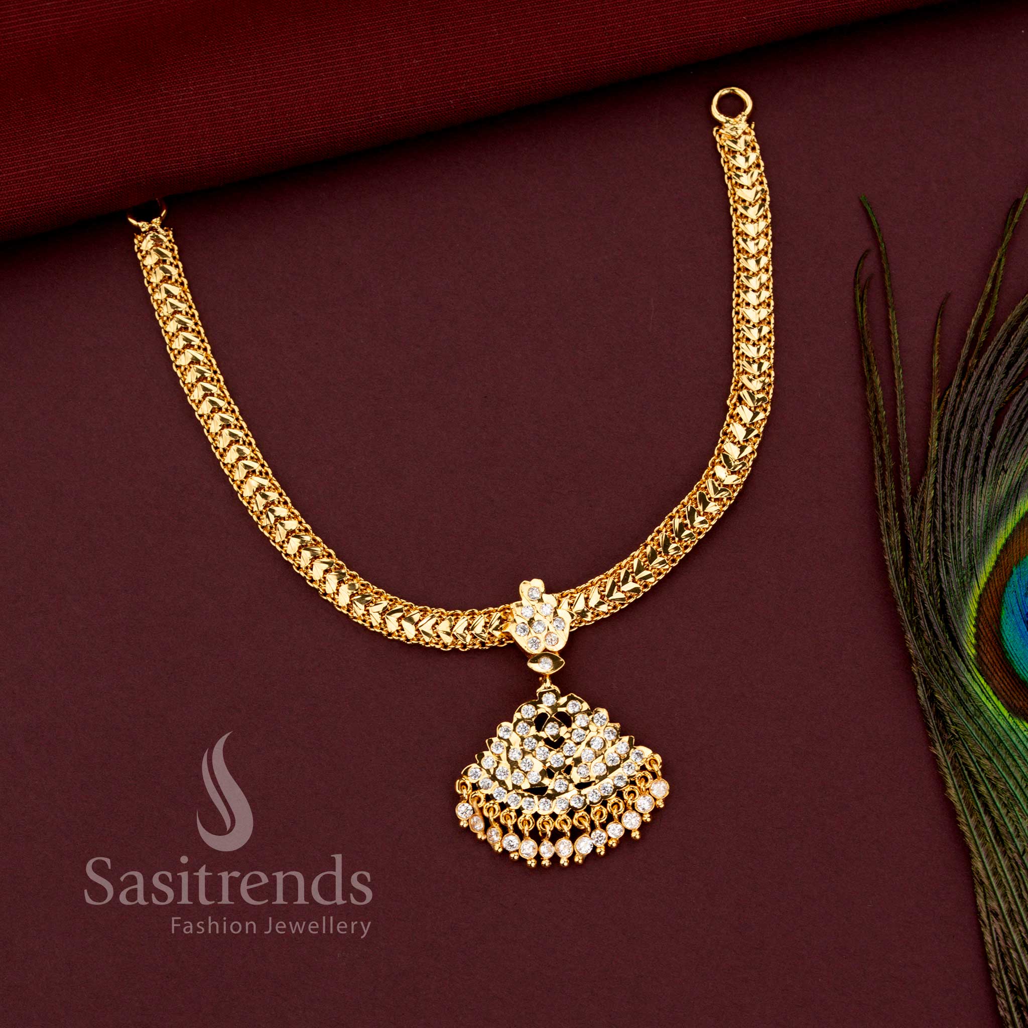 Impon micro gold plated festive necklace with artistic White AD stone pendant 