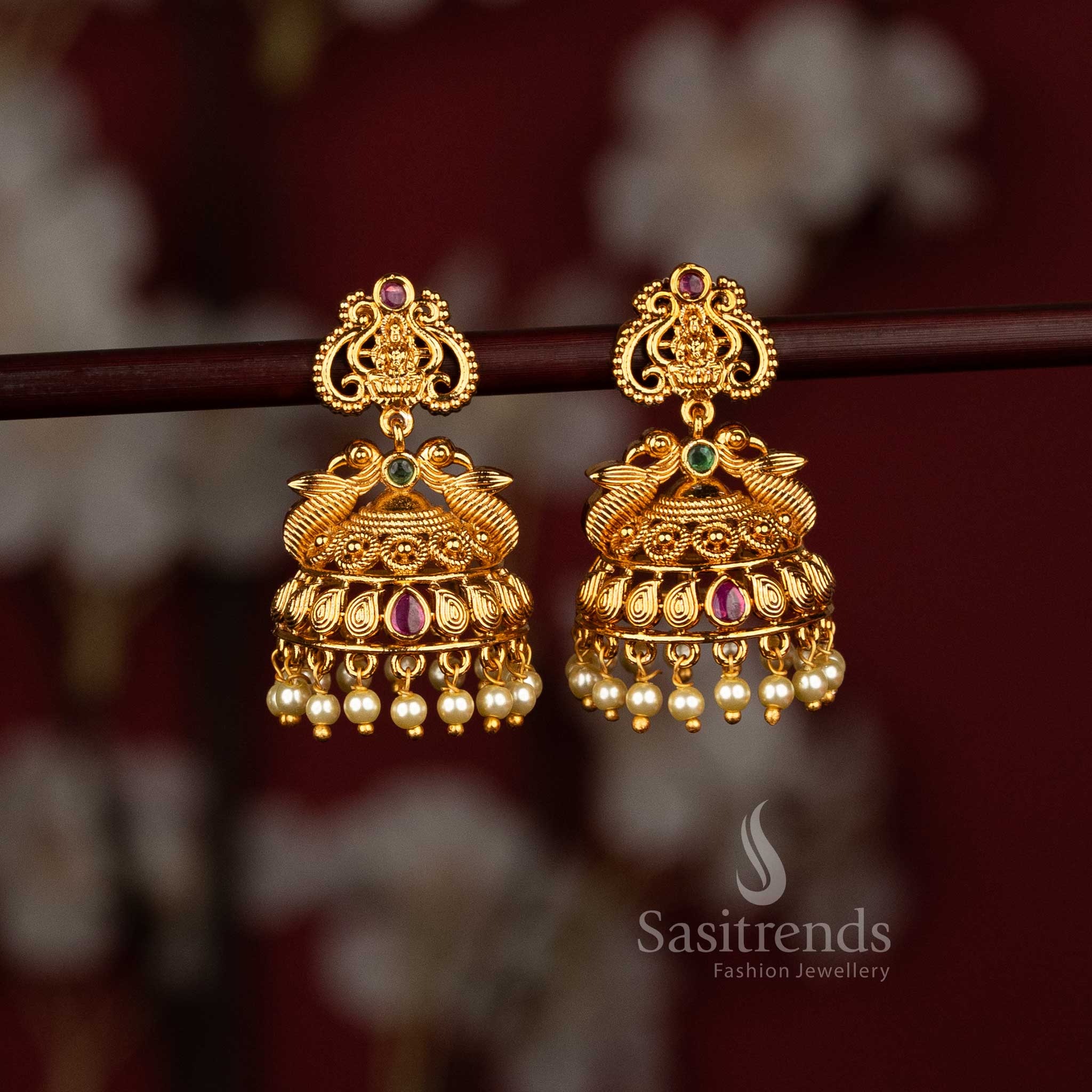 Splendid temple matte gold peacock filigree pearl dome jhumka earrings designed for bridal wedding elegance, traditional attire and festive gatherings - Sasitrends
