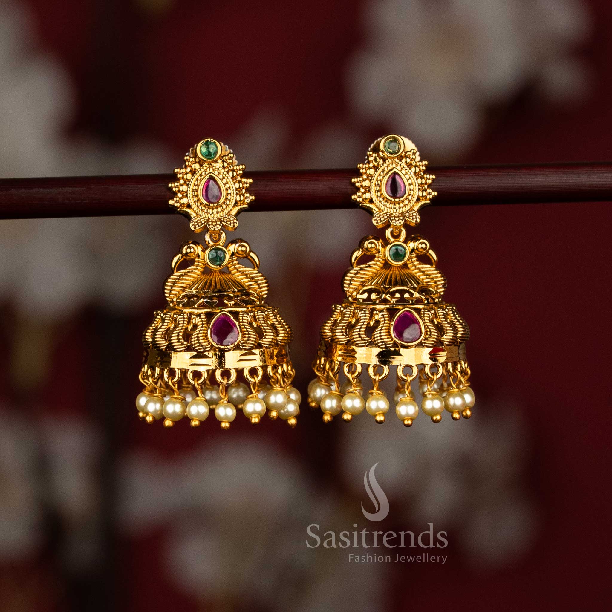 Collection of Temple Matte Gold Plated Jhumka Earrings | Textured Diamond with Filigree Dome & Lakshmi Peacock Motif Pearl and Floral Jhumka with Pearls for Bridal Wedding and Festive Wear - Sasitrends