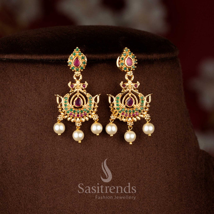 Sparkling impon earrings in ruby green glowing with pear brilliance and pearls – Sasitrends