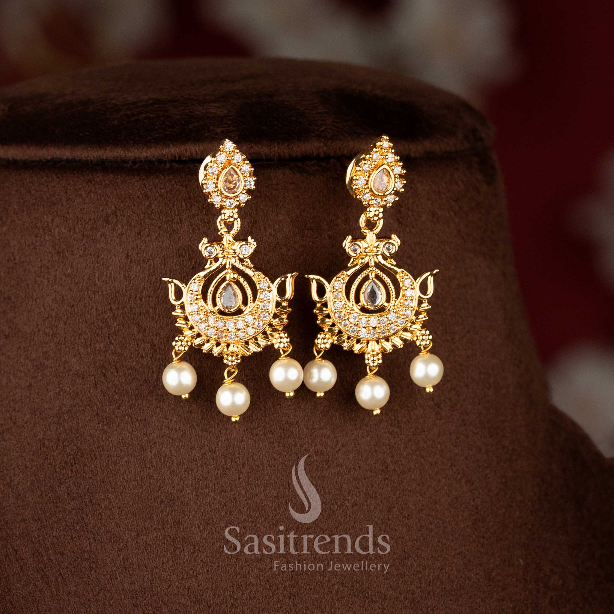 Charming impon earrings in white inspired by mayura styling, glowing pear brilliance and elegant pearls – Sasitrends