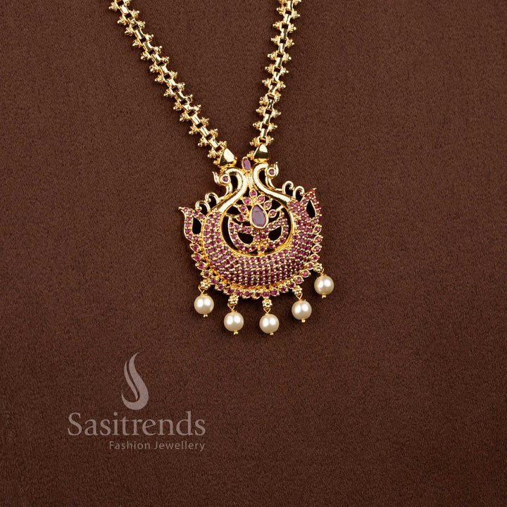 Grand classic necklace in ruby reflecting peacock artistry with bright pear centre and pearls – Sasitrends