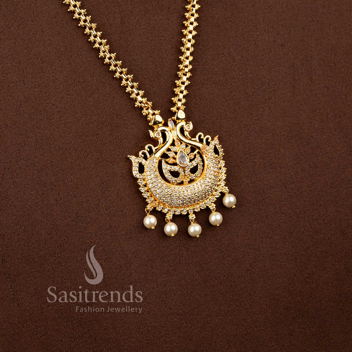 Divine gold toned necklace in white portraying peacock elegance enhanced with pear glow and pearls – Sasitrends