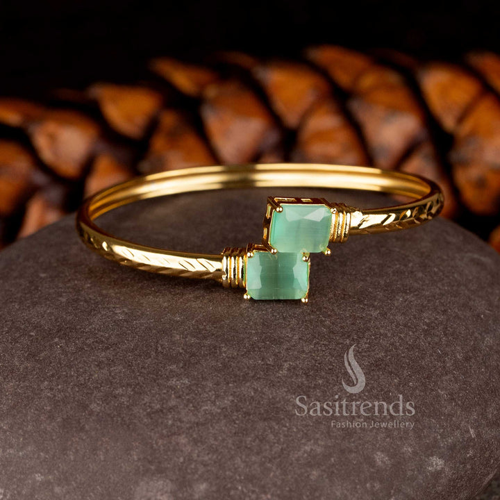 Minimalist Micro Gold Plated openable bracelet featuring two rectangular American Diamond stones on a hammered gold band - Sasitrends