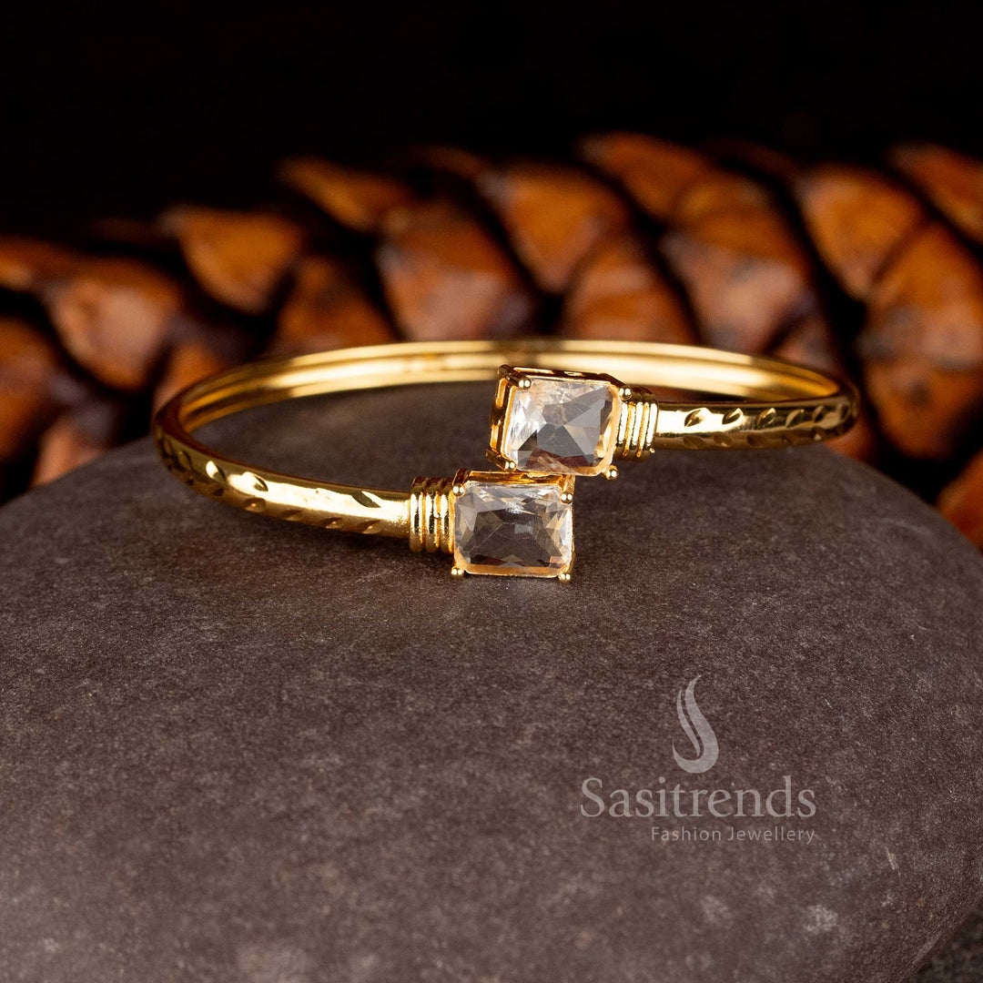 Minimalist Micro Gold Plated openable bracelet featuring two rectangular American Diamond stones on a hammered gold band - Sasitrends